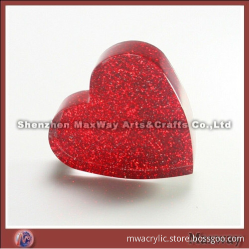 Red heart-shaped acrylic papeweight